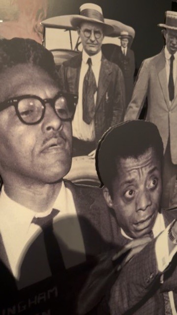 Large black-and-white collage in Arthur Jafa: I Am Tony with Bayard Rustin in glasses and James Baldwin in the foreground and men in hats behind them